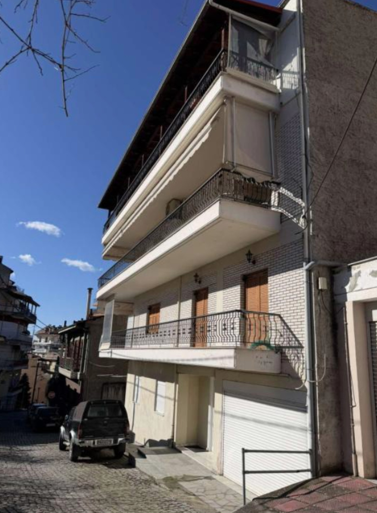 Four-Storey Residential Building with Basement and Roof